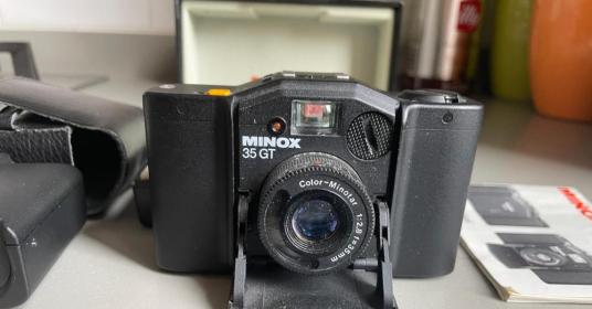 Minox 35 GT “Mint” con scatola, manuali + flash originale (Roma) Minox 35 GT “Mint” con scatola, manuali + flash originale (Roma)
